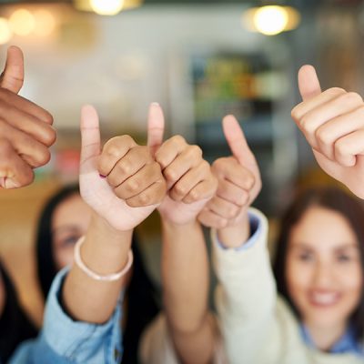 People, cooperation or thumbs up with support, agreement or icon with celebration, thank you and sign. Group, employees or diversity with staff, collaboration or like with symbol, emoji or coworkers.